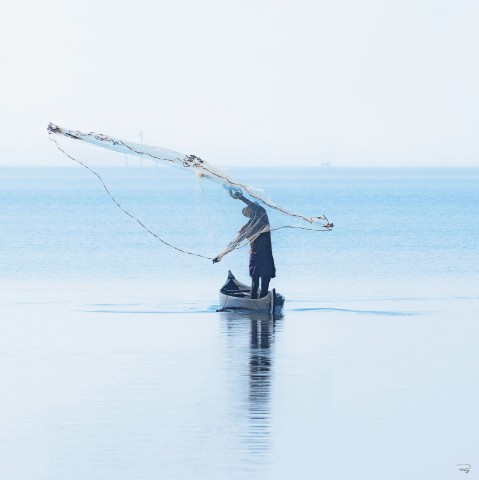 Photo Sur la plagePêcheur à l'épervier, Inde par Philip Plisson